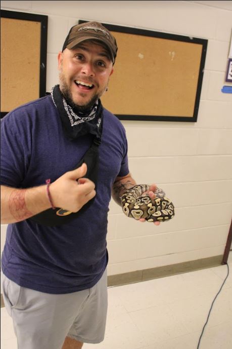 Man holding a snake